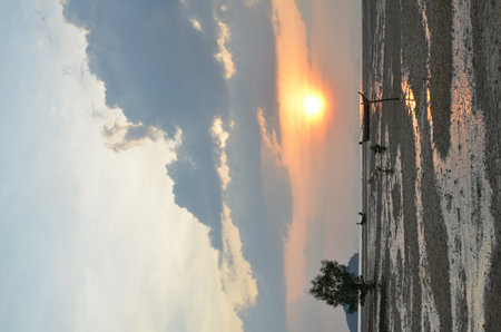 Sunset at Beach Phuket tropical coast ocean landscapeの写真素材