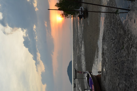 Sunset at Beach Phuket tropical coast ocean landscapeの写真素材