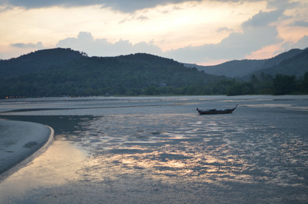 Sunset at Beach Phuket tropical coast ocean landscapeの写真素材