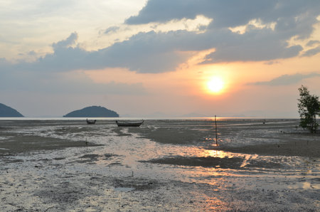 Sunset at Beach Phuket tropical coast ocean landscapeの写真素材