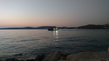 fishermen Angler sunset Paros Greece mediteranean island aegeanの写真素材