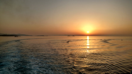 Sunset on Ferry Paros Greece mediteranean island aegeanの写真素材