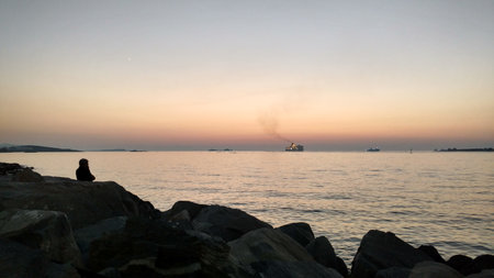 fishermen Angler sunset Paros Greece mediteranean island aegeanの写真素材