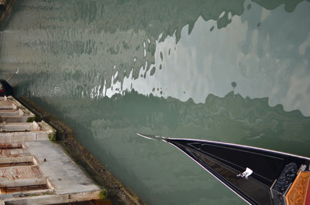 small canal venice italy romatic gondoliere bridge beautifulの写真素材