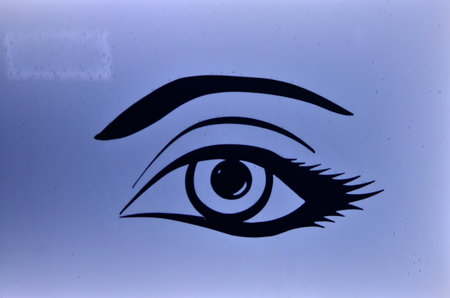 Eye symbolic painting on Glass blue Blackの写真素材