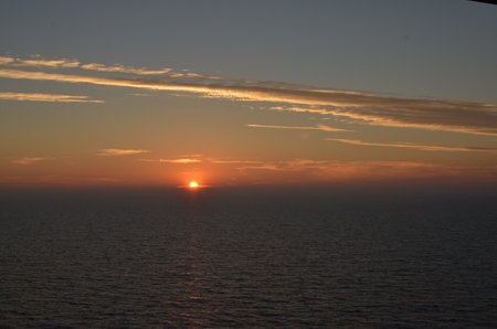sunset at Sea ocean to horizon colorfull pastell calmの写真素材