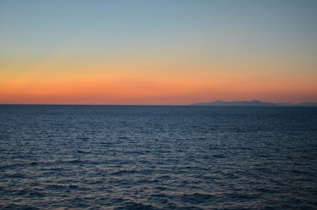 Sun is gone Dawn at Sea colorfull Ocean Horizonの写真素材