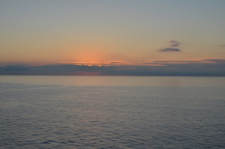 Bright Sunset mediterranean Sea Italy colorfull reflection on Oceanの写真素材