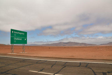 Road to Antofagasta Chile Roadsign Green Brownの写真素材
