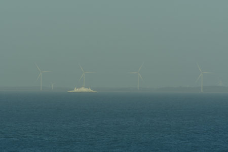 ship on Horizon blue in blue background . High quality photo