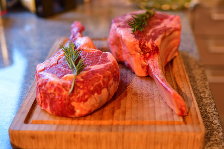 Tomahawk Steak Raw on cutting board food barbecue . High quality photoの写真素材