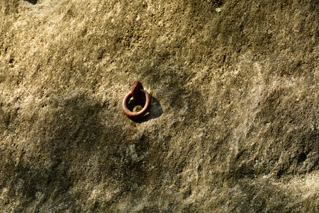 Rock wall Sandstone with anchor ring of steel vertical. High quality photoの写真素材