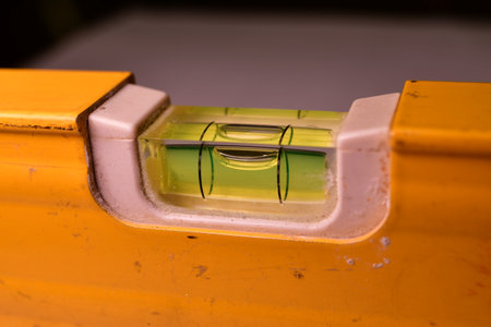 spirit level ruler yellow precision bubble close up. High quality photoの写真素材