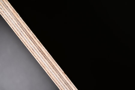 plywood edge black background copyspace industrial. High quality photoの写真素材