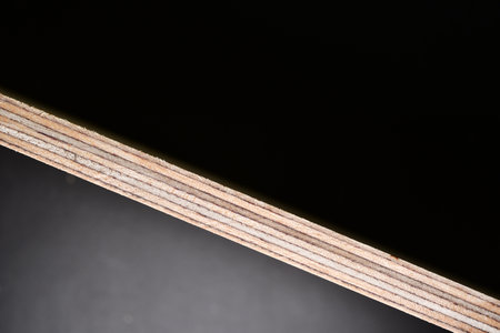 plywood edge black background copyspace industrial. High quality photoの写真素材