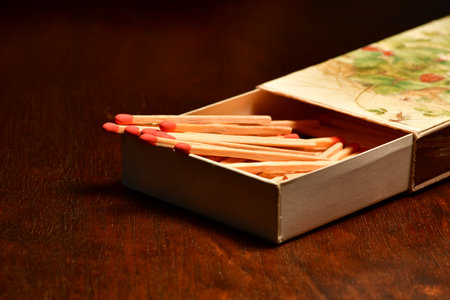 Matchstick matchbox on Table macro classic decoration fire candle retro. High quality photo