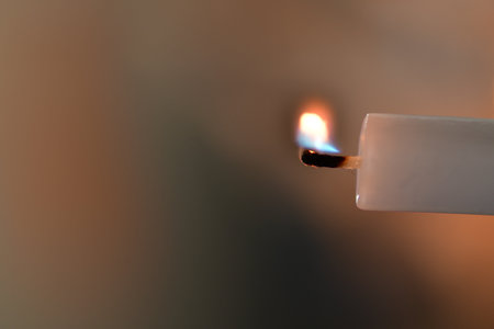 Candle Flame ignition smoke fire wax stick decoration light. High quality photoの写真素材