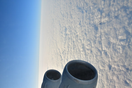 View of sunset from Airplane Window jet engine wing colorful. High quality photo