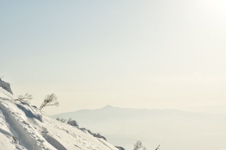 Mt Yotei steep ascent in Snow to top Views sun panorama Hokkaido Japan. High quality photoの写真素材