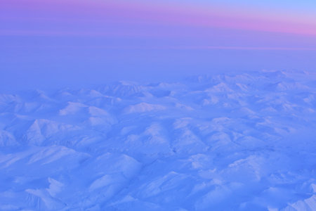View of Greenland from Jet Plain Window in Winter Nature cold ice Mountains. High quality photo