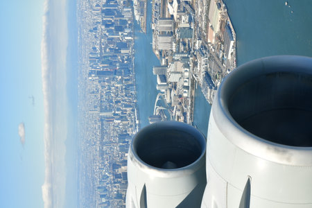 Tokyo Area from Airplane Window Jet Engine Wing. High quality photo