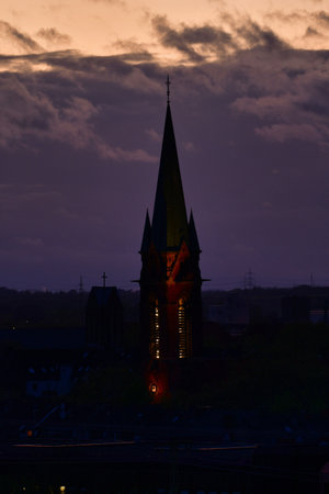 St. Michael Church Dortmund Ruhrgebiet Germany in sunset clouds dramatic light. High quality photoの写真素材