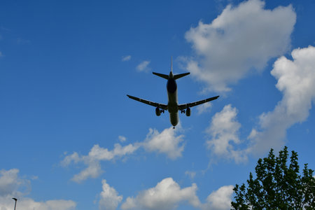 jet landing blue sky clouds. High quality photo