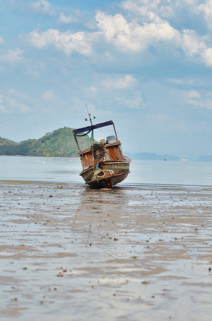 long tail boat on coast of thailand asia sunset. High quality photoの写真素材