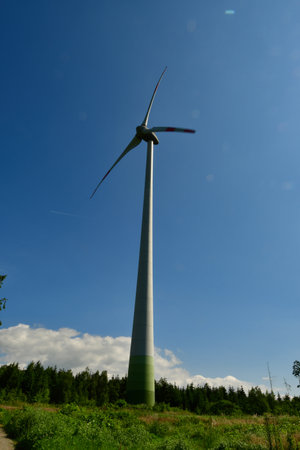 Windmill wind turbine electric energy wind park ecology renewable. High quality photo