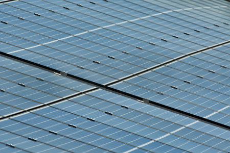 photovoltaic power electricity energy renewable sun green background. High quality photo