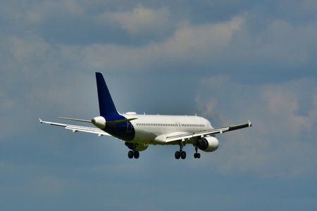 Aircraft on blue sky with clouds aviation travel Frankfurt am Main. High quality photo