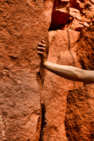 hand on rock climbing pushing nature women young. High quality photoの写真素材