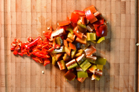 fresh tomato and bell pepper on board wooden heartの写真素材