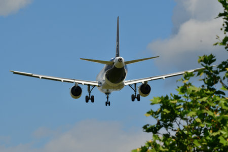 Jet Airplane aircraft landing in FRA Frankfurt Germanyの写真素材