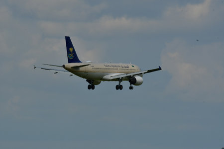 Aircraft on blue sky with clouds aviation travelの写真素材