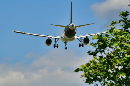 Jet Airplane aircraft landing in FRA Frankfurt Germanyの写真素材