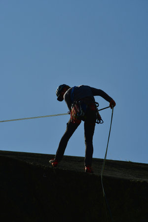 Abseiling Climbing Outdoor scenic rope rappeling rock adventureの写真素材