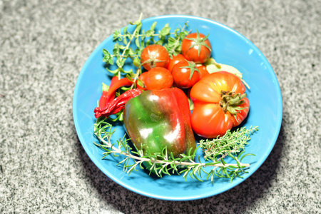 Fresh Tomato Paprika Pepper and Herbs from Garden Home gardeningの写真素材