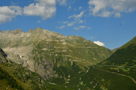 Alpine Road Grimsel Pass swizerland Alps curves europe Furkapass mountain scenery. High quality photoの写真素材