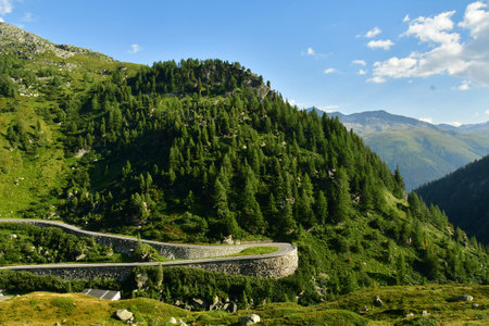Alpine Road Grimsel Pass Switzerland Alps curves europe Furkapass mountain scenery. High quality photoの写真素材