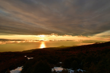 Sunset from Osorno Volcano in winter refugio teskie views colorful orange blue. High quality photoの写真素材