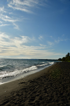 calbuco Vulcano patagonia chile from beach of lake Llanquihueの写真素材