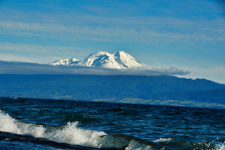 calbuco Vulcano patagonia chile from beach of lake Llanquihueの写真素材