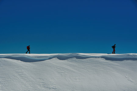 man on ski climbing snow patagonia chile touring top backcountry cornice. High quality photo