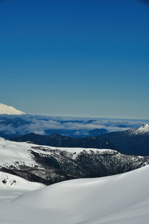 Chile ski panorama top touring mountaineering patagonia volcano snow blue sky background. High quality photoの写真素材