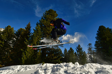 Ski jumps in Forest Alps trick backcountry snow fun. High quality photoの写真素材