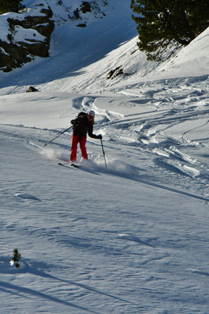 Women ski powder top touring speed fun snow. High quality photoの写真素材