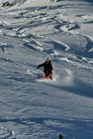 Women ski powder top touring speed fun snow. High quality photoの写真素材