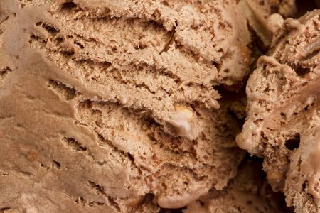 Close-up of chocolate ice cream, brown and about to melt