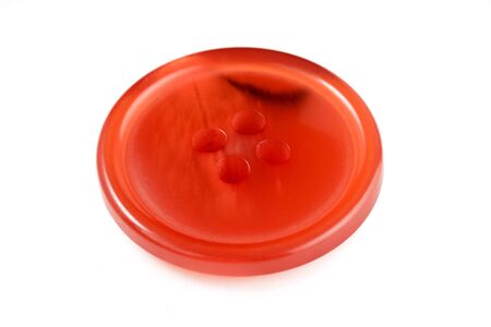 One plastic red button isolated on white background